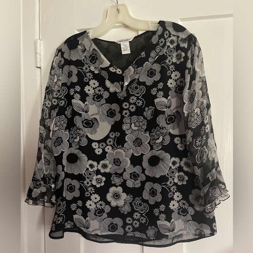 Black and white sheer blouse with lining.